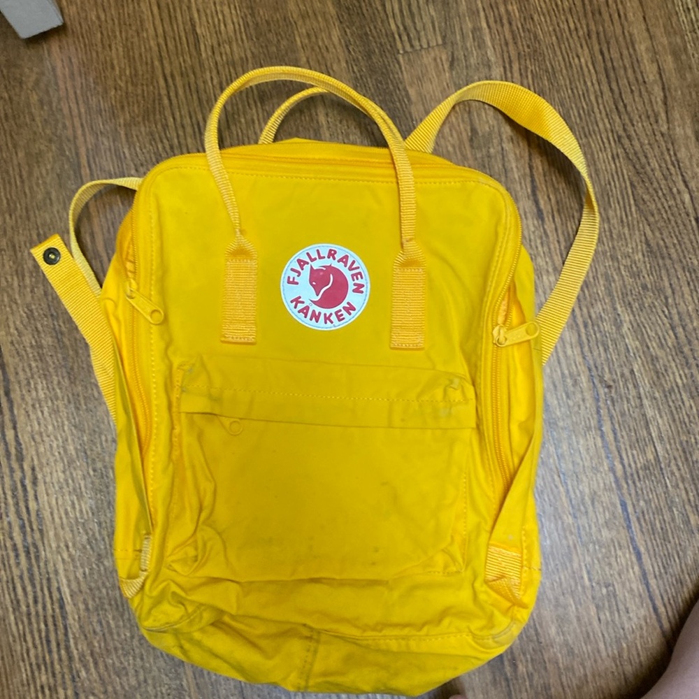 Fjall Raven Kanken Backpack yellow, stains on bottom as pictured